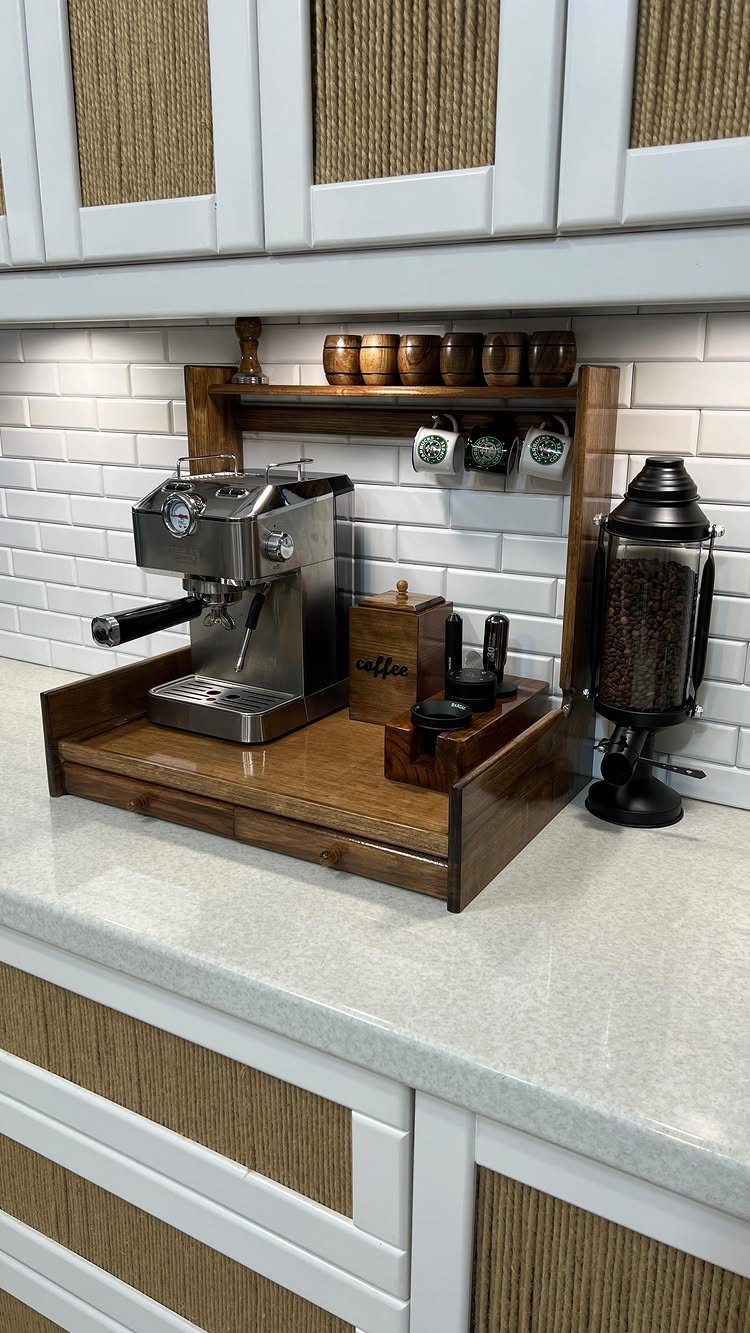 Wooden coffee station with espresso machine and mugs hanging from a peg rack