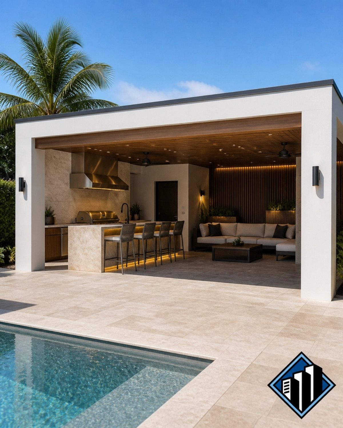 Covered patio kitchen with bar seating and lounge area next to a swimming pool